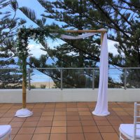 Arbour with Drapes and Flower Arrangement
